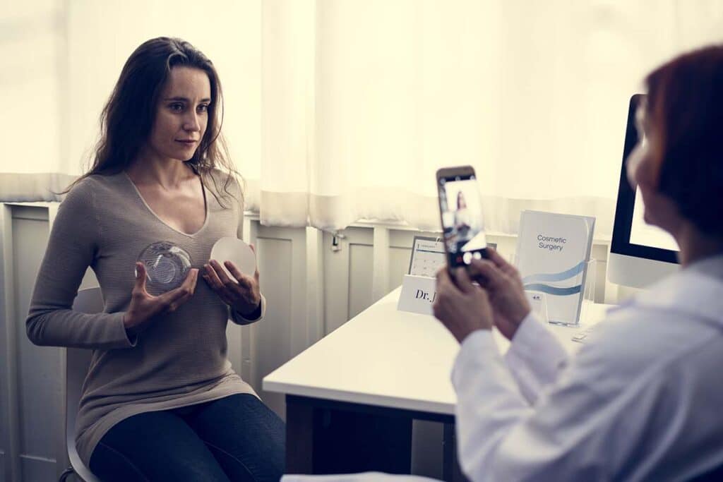 woman choosing breast implants